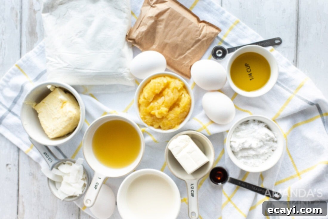 Golden Pineapple Bliss 4 Ingredients laid out for making the Pineapple Coconut Cake, including cake mix, eggs, pineapple, cream cheese, butter, and extracts.