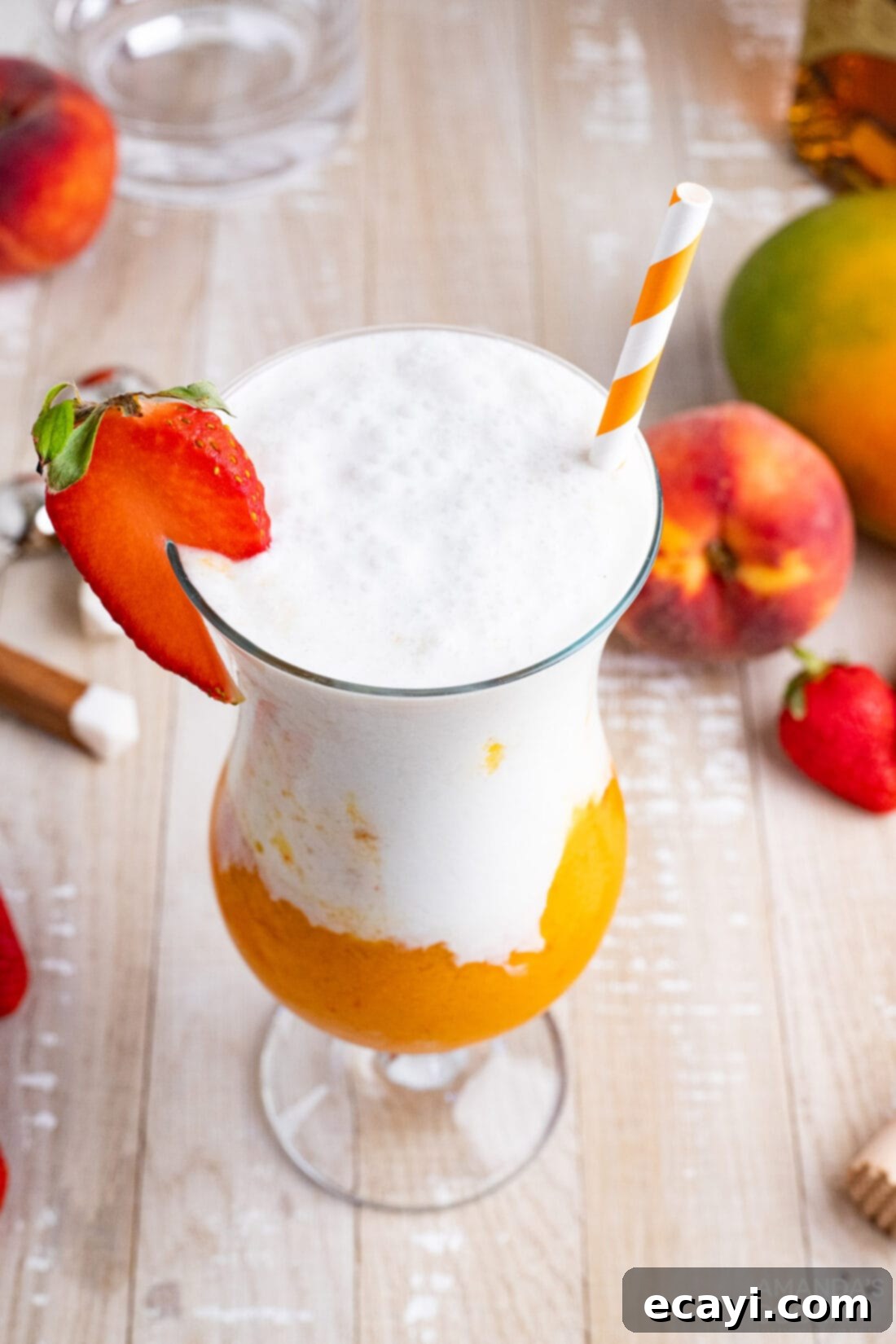 Island Vibes Rum Slush 8 A beautifully layered Tropical Rum Slush cocktail, garnished with fresh fruit, set on a bright background and ready to be enjoyed as a refreshing summer drink.