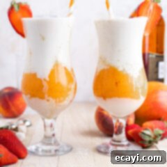 Island Vibes Rum Slush 9 Tropical Rum Slush cocktail in a clear glass with fruit garnish, ready for a summer party