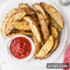 Golden Spiced Wedges 11 Plate of Potato Wedges with dipping sauce