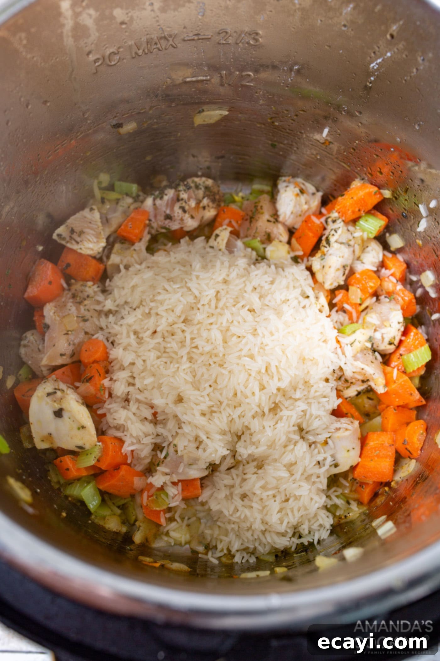 Effortless Instant Pot Chicken and Rice 6 Rinsed rice, chicken, and sautéed veggies combined in an Instant Pot