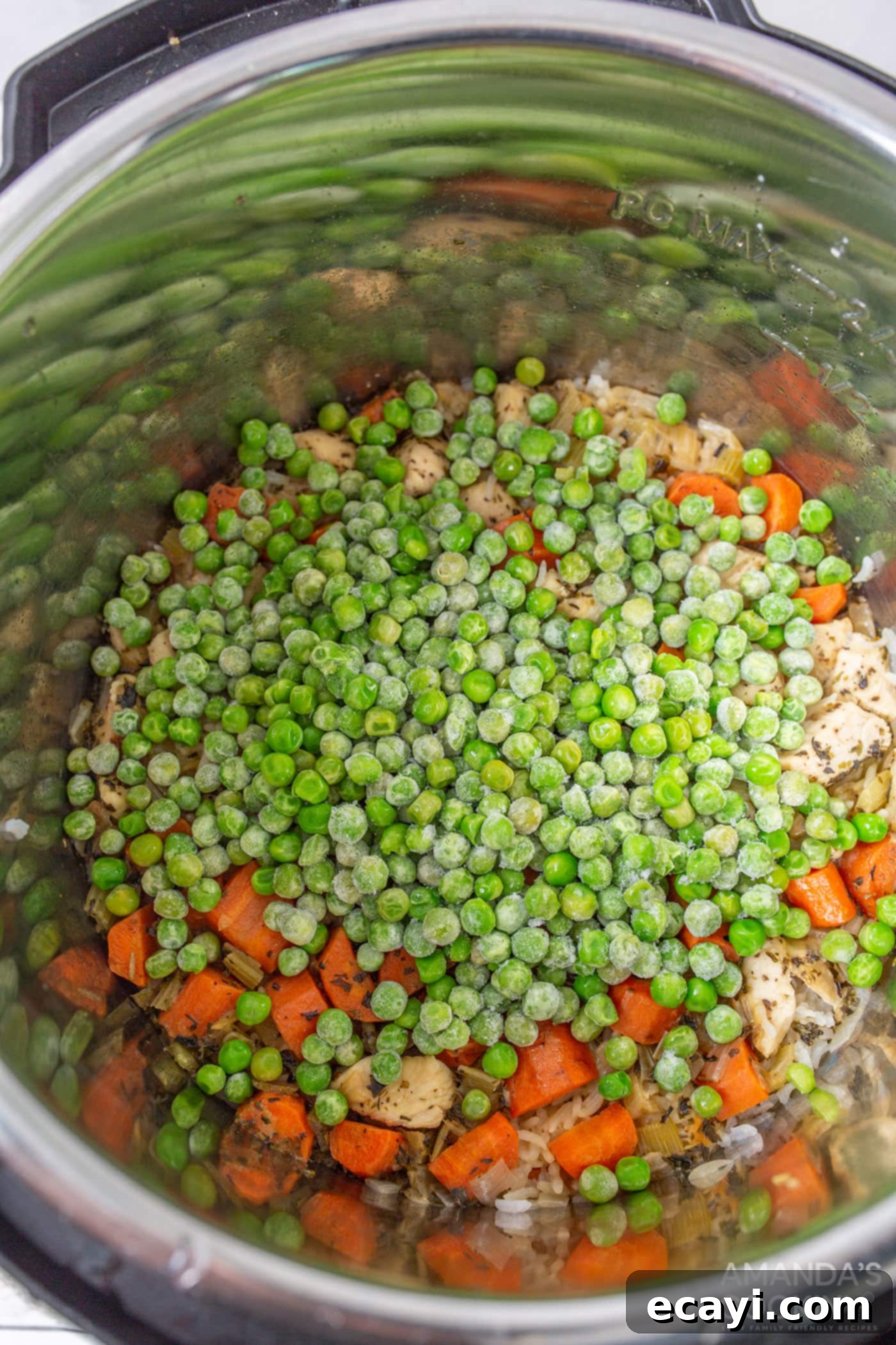 Effortless Instant Pot Chicken and Rice 8 Vibrant frozen peas added to the cooked chicken and rice in the Instant Pot