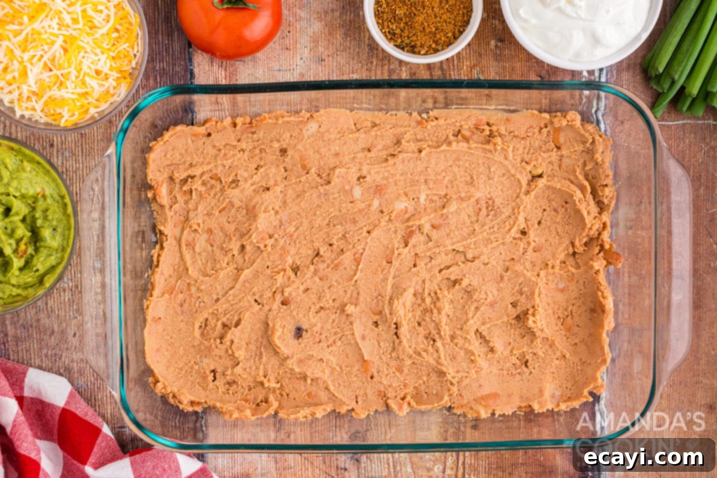 Stars and Stripes Salad 5 refried beans in pan