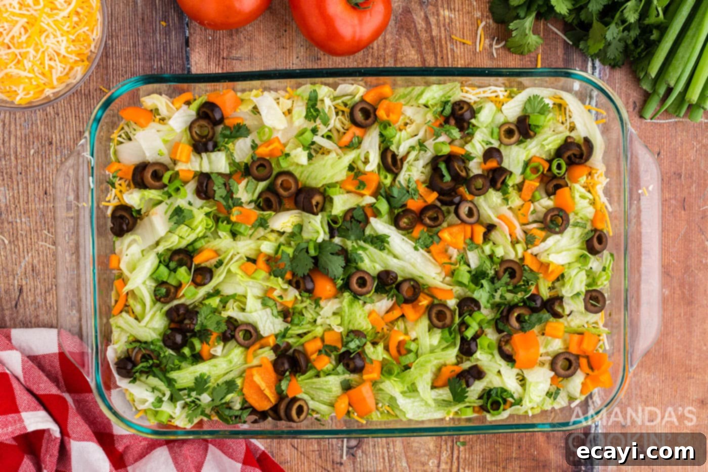 Stars and Stripes Salad 8 veggies on top of taco dip
