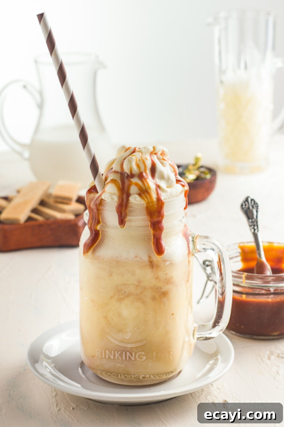 Decadent Salted Caramel Shake 2 salted caramel milkshake in a mason jar glass