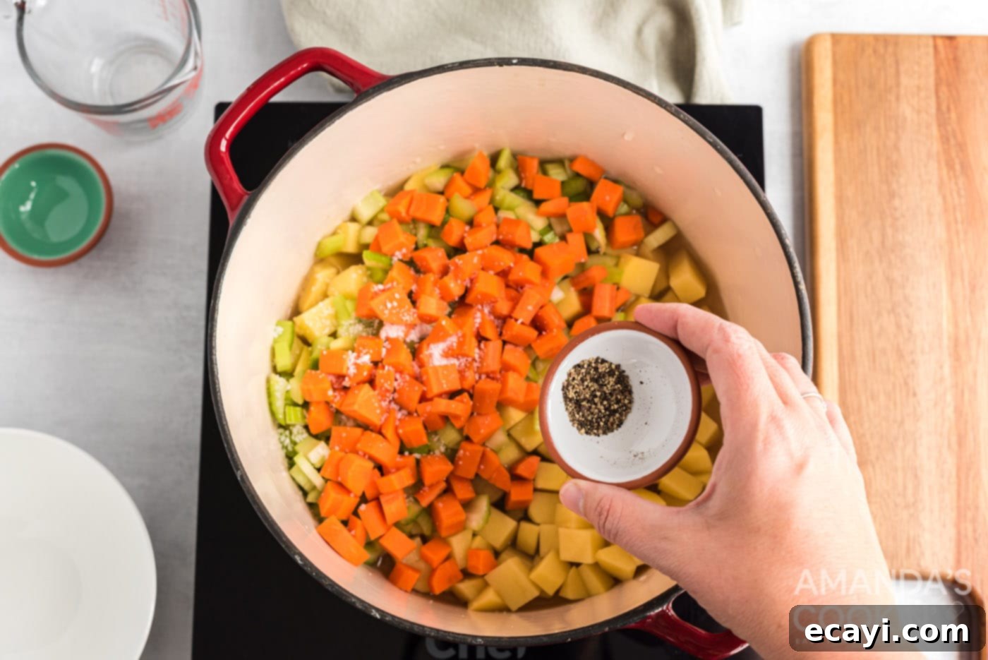 Creamy Corn Chowder 6 potatoes, carrots, celery, chicken broth and pepper in a saucepan