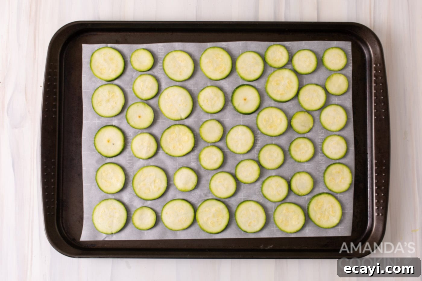 Zucchini Pizza Bites 5 sliced zucchini on a sheet pan