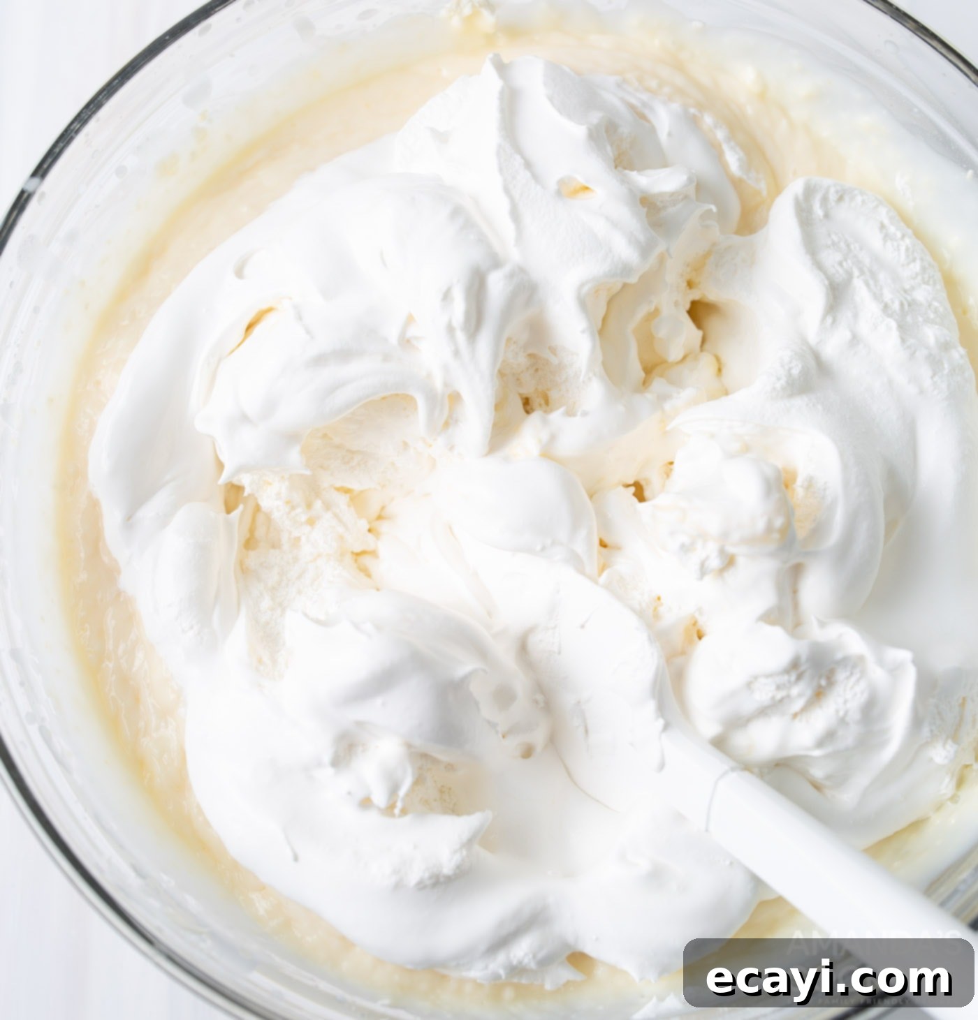 Celebration Confetti Chiller 5 vanilla pudding, cream cheese, and cool whip in a mixing bowl