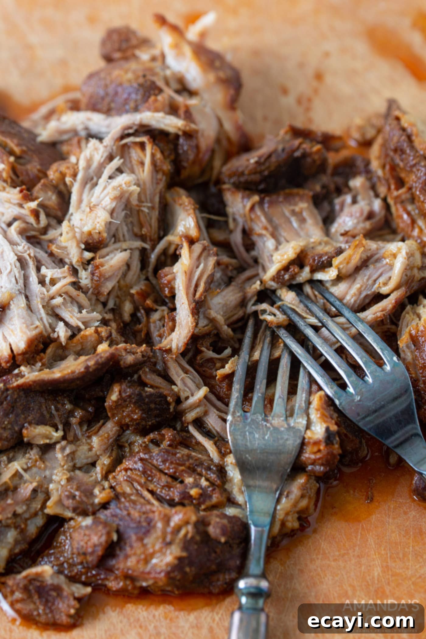 Perfectly Tender Instant Pot Pulled Pork 10 shredding pulled pork with forks