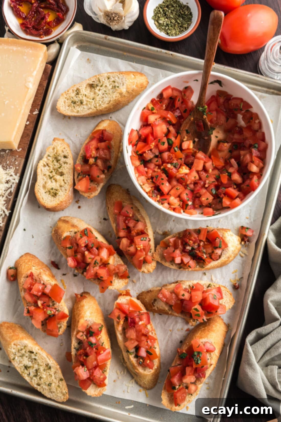 Crafting Perfect Bruschetta 2 A beautifully arranged pan of golden bruschetta slices with a side bowl of fresh tomato and basil topping.