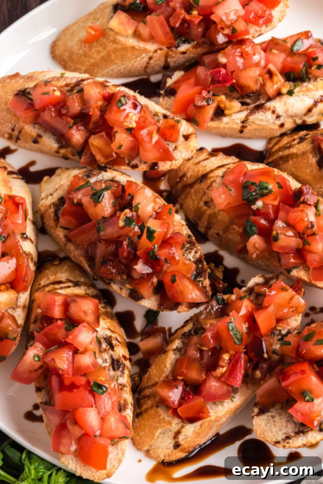 Crafting Perfect Bruschetta 3 Close-up of toasted bruschetta topped with a rich balsamic glaze, highlighting the fresh ingredients.