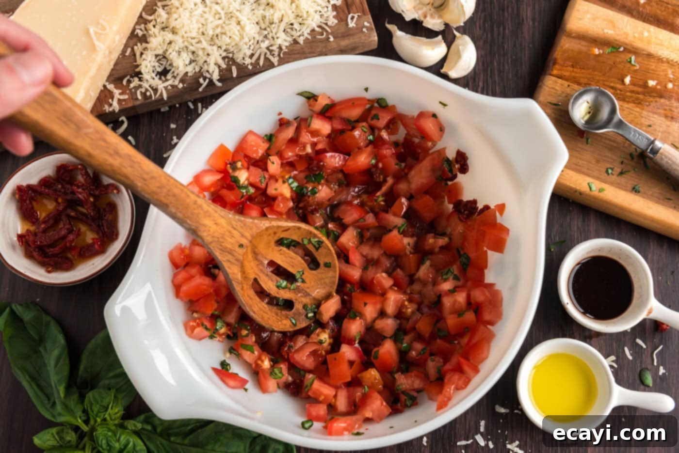 Crafting Perfect Bruschetta 5 Bowl of freshly chopped tomatoes, basil, garlic, and balsamic vinaigrette marinating.