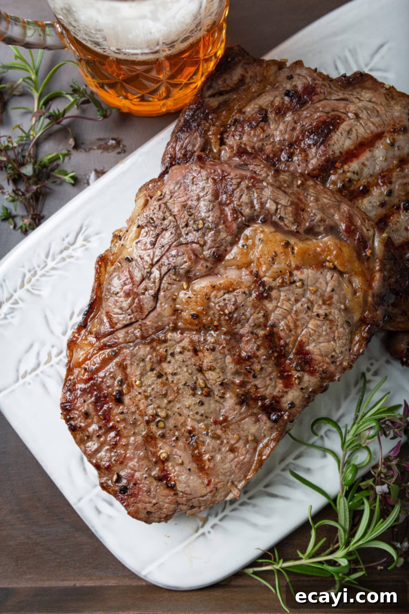 Perfectly Grilled Steak 8 Perfectly grilled steak resting on a plate, allowing juices to redistribute