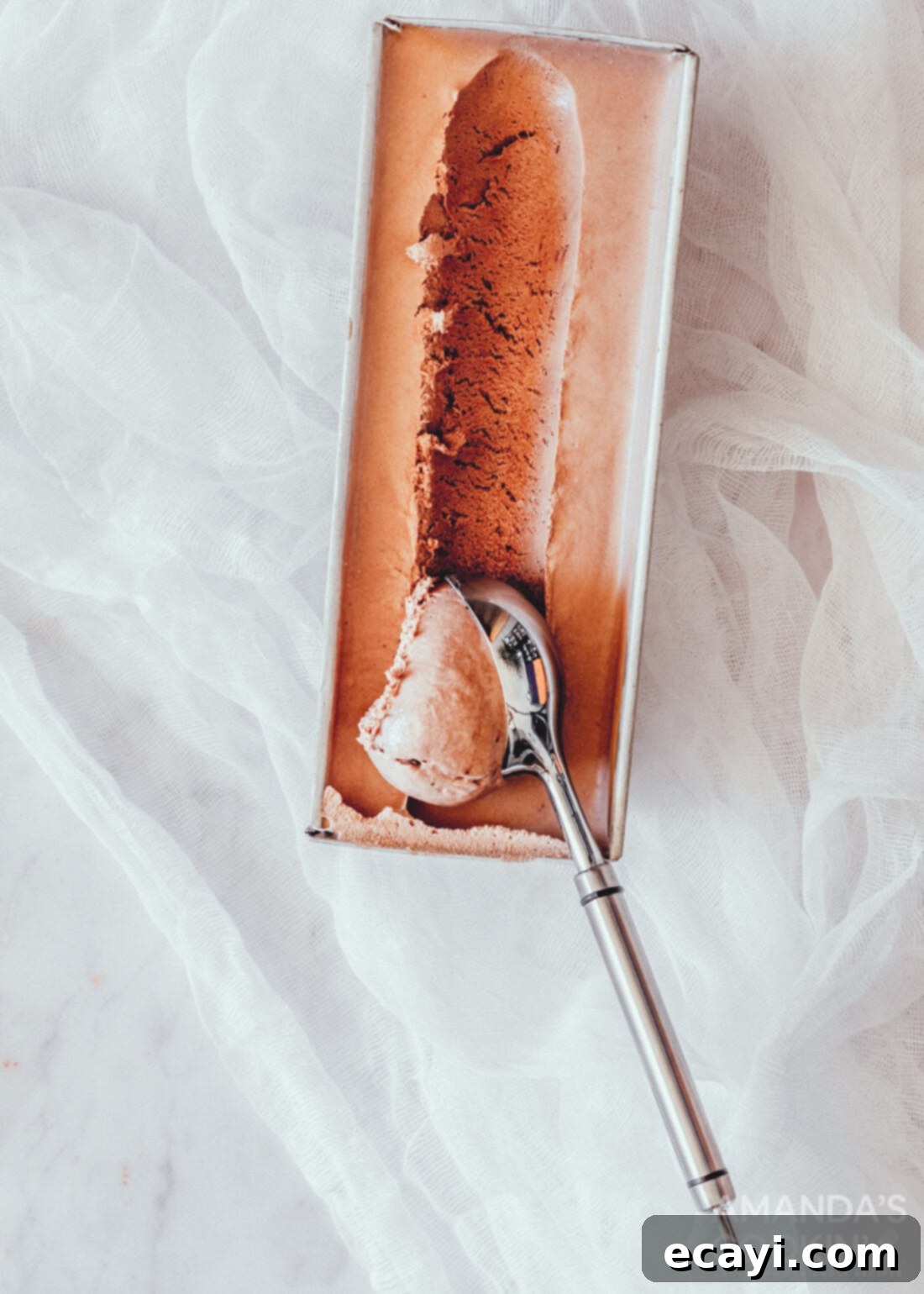 Decadent No-Churn Chocolate Ice Cream 8 scooping chocolate ice cream