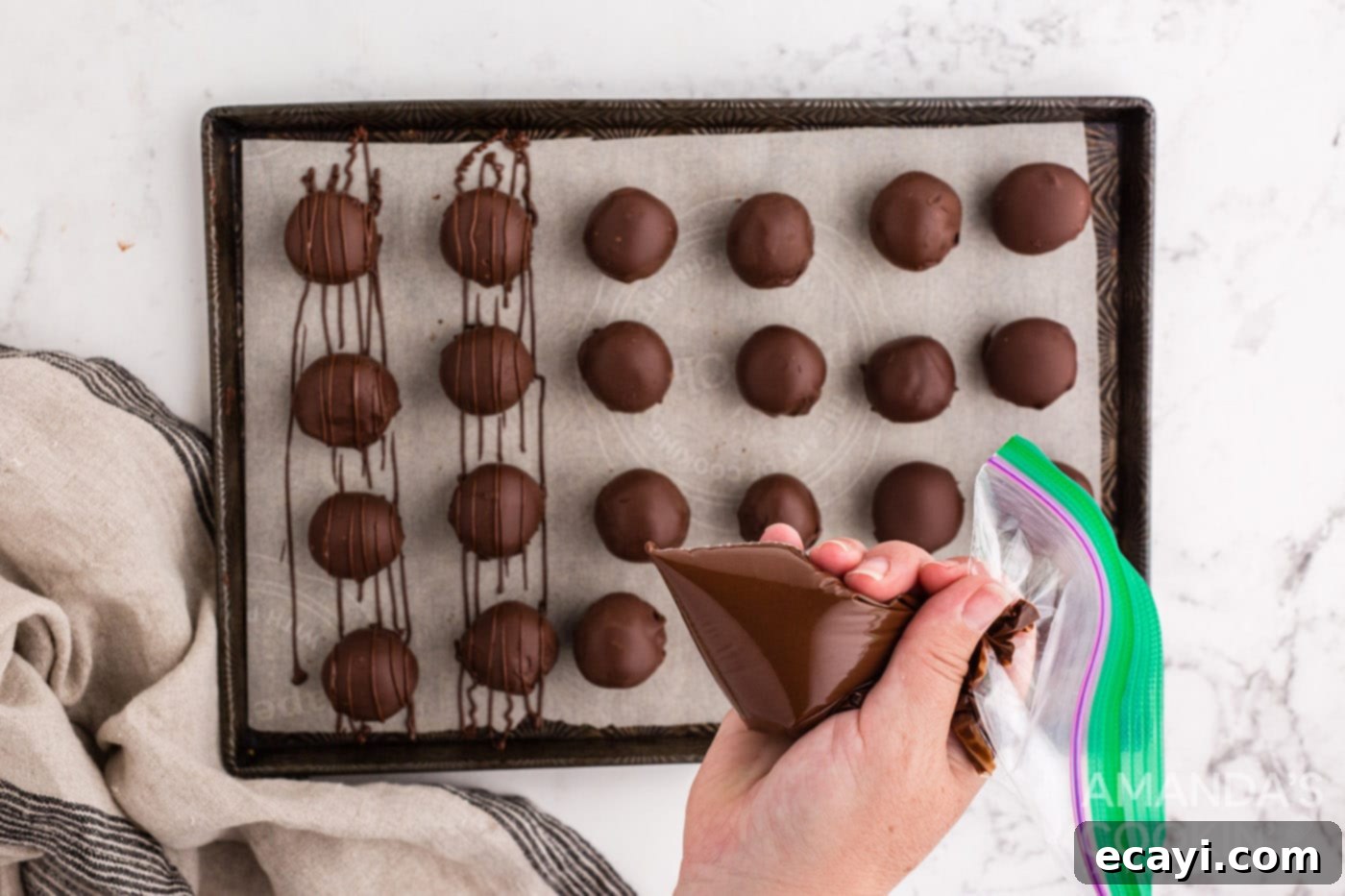 Peanut Butter Chocolate Delights 12 piping chocolate drizzle over chocolate peanut butter balls