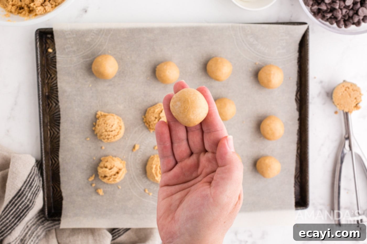 Peanut Butter Chocolate Delights 8 hand holding peanut butter ball