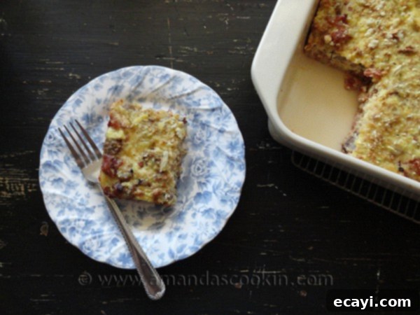 Herbed Breakfast Stuffing Casserole An overhead photo of a serving of herbed breakfast stuffing casserole on a white and blue plate.