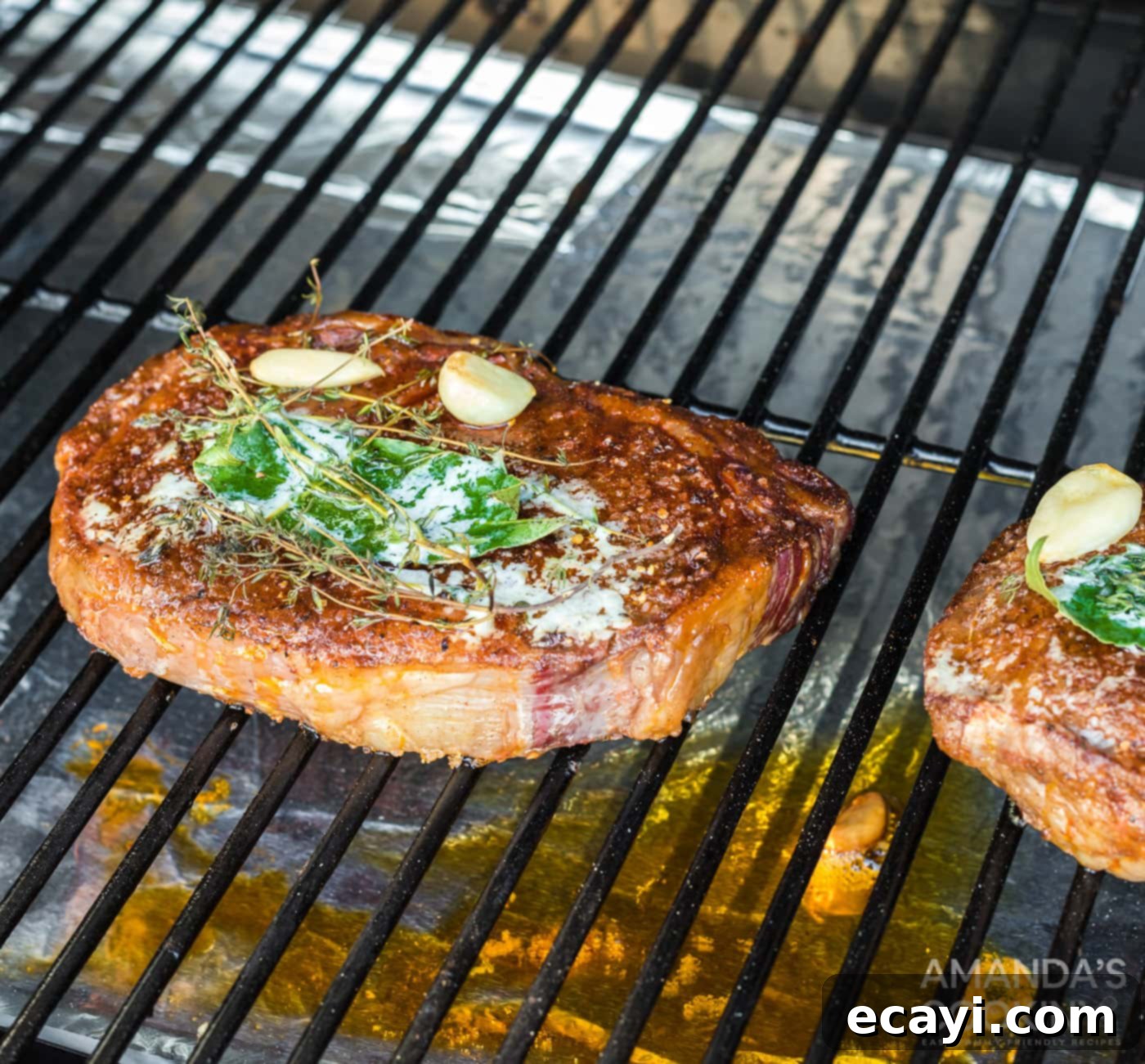 Slow-Smoked Ribeye 9 Smoked ribeye steaks removed from the smoker and resting while the grill heats up for searing.