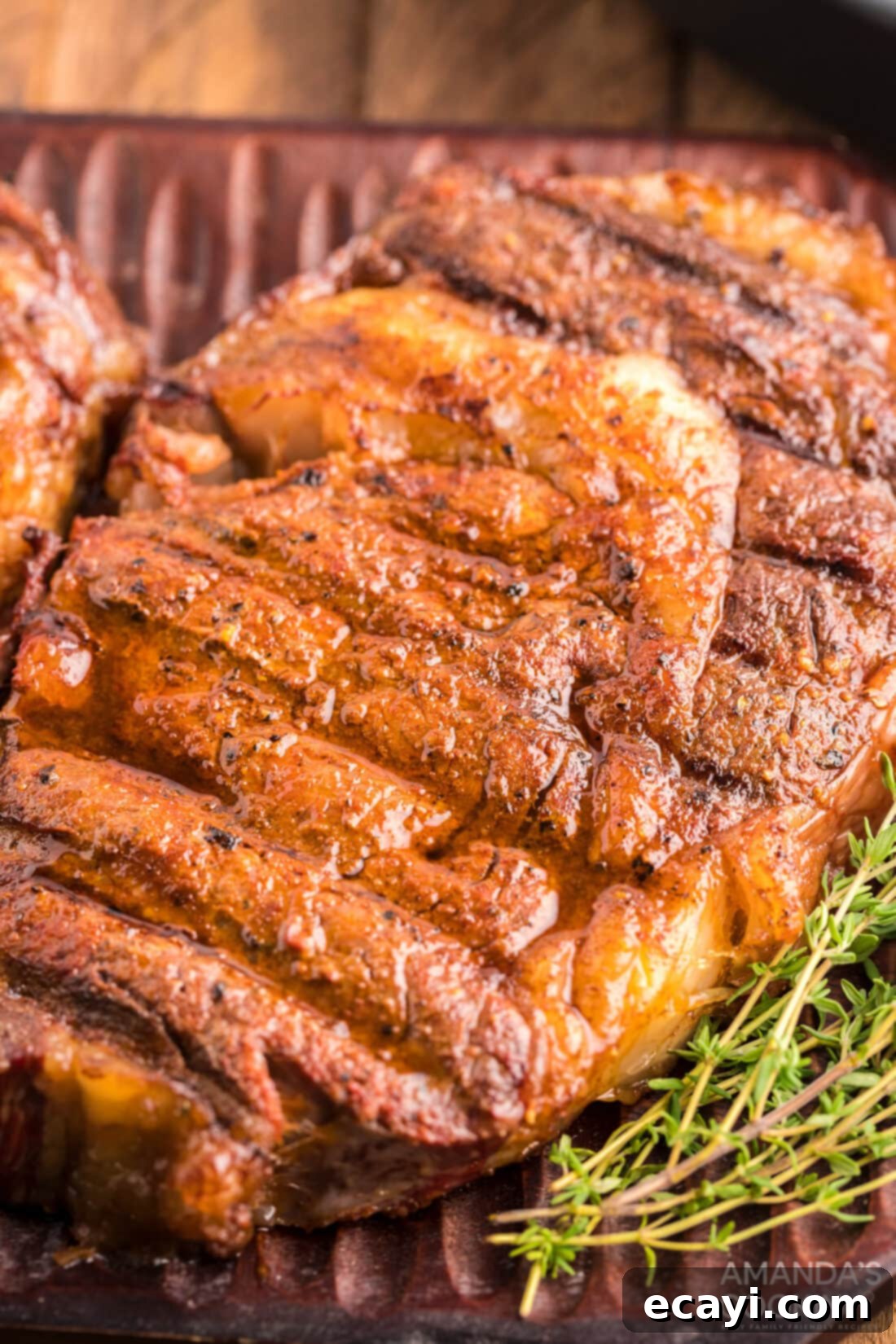 Slow-Smoked Ribeye 10 A close-up view of the perfectly seared crust on a smoked ribeye steak, showcasing its rich color and texture.