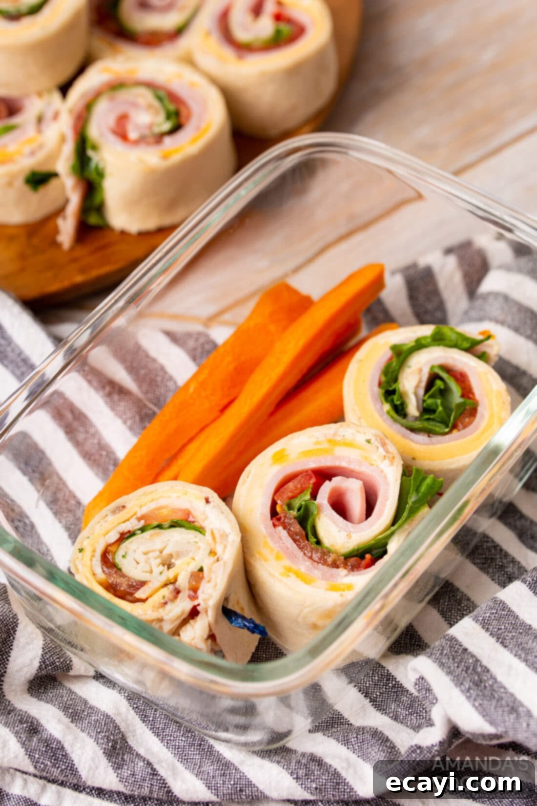 Swirl Sandwiches 11 Club-Style Pinwheel Sandwiches in a Lunch Container with Carrots