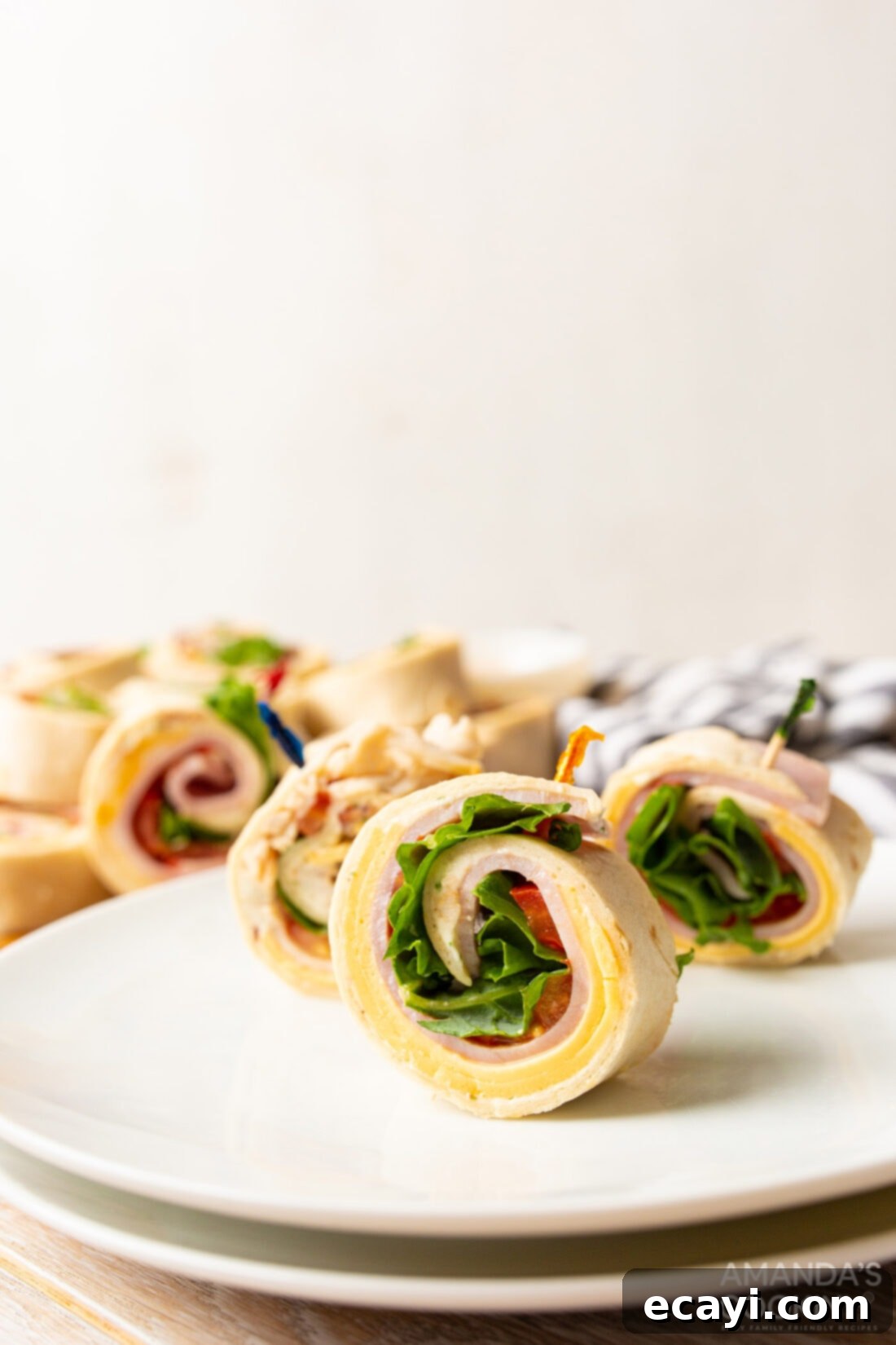 Swirl Sandwiches 3 Close-up of Pinwheel Sandwich Appetizers on a Platter with Toothpicks