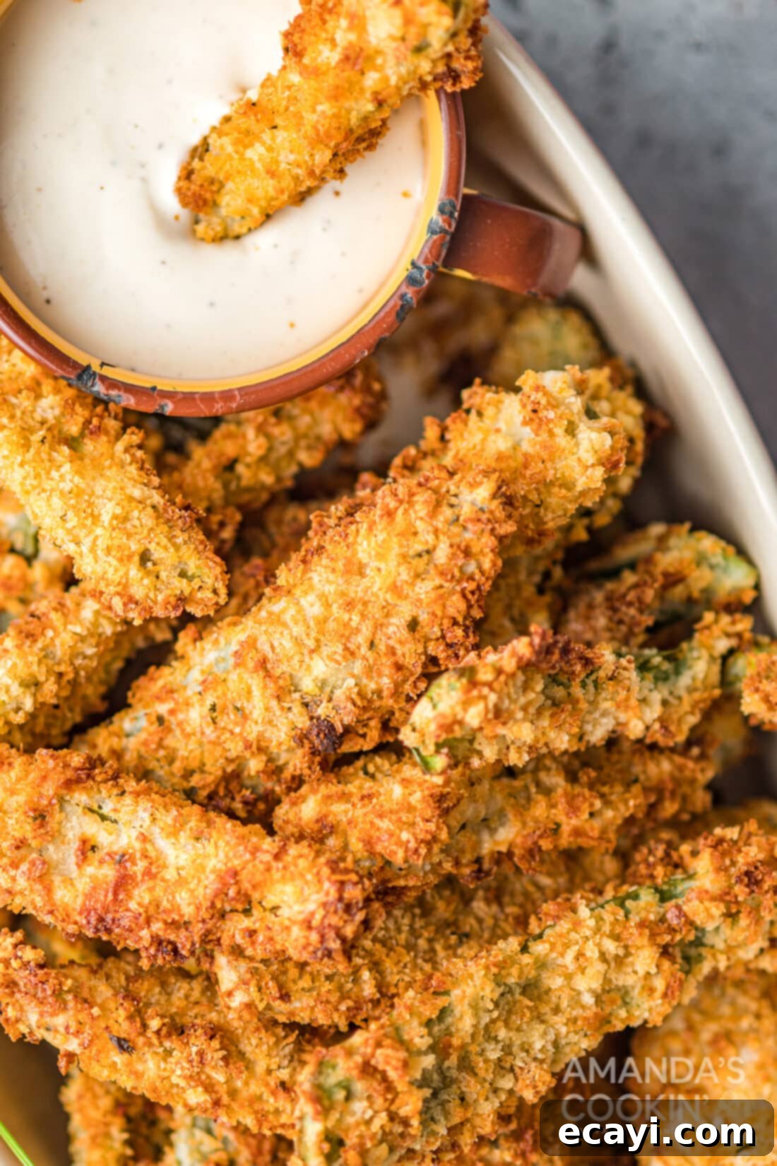 Crispy Air Fryer Jalapeño Fries 3 Crispy Air Fryer Jalapeno Fries ready to be dipped, with a creamy sauce alongside