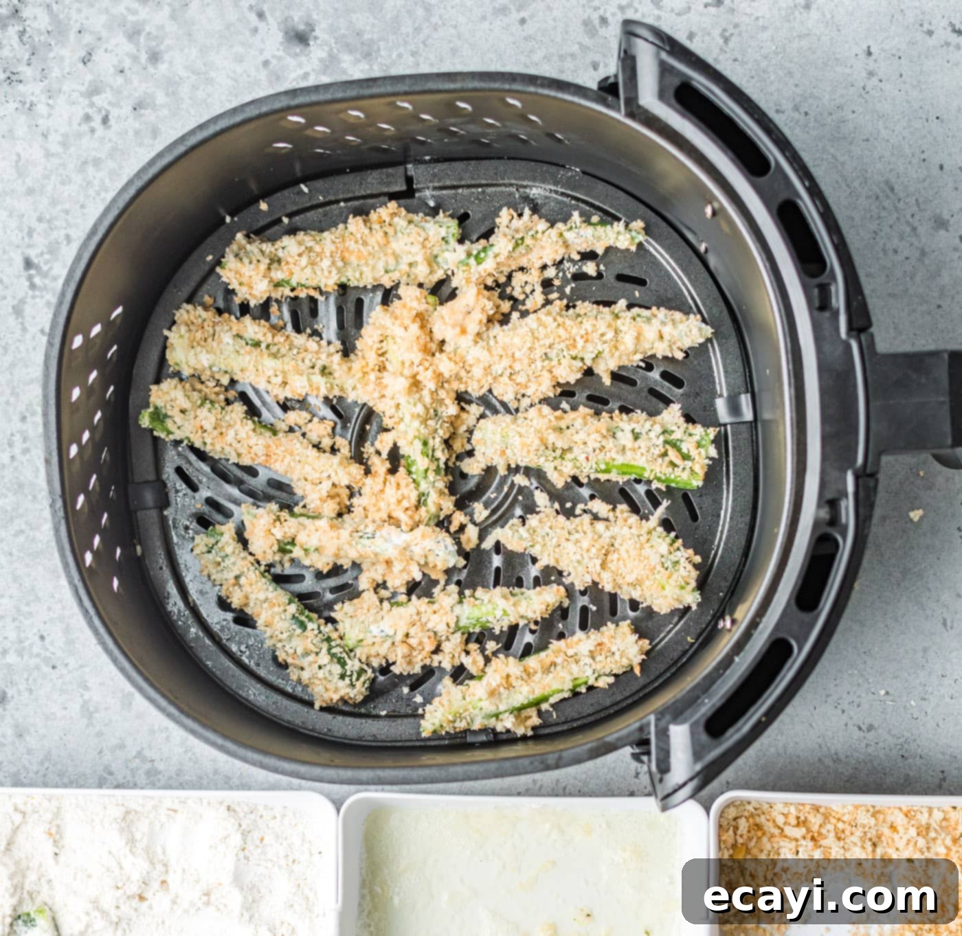 Crispy Air Fryer Jalapeño Fries 6 Breaded jalapeno fries neatly arranged in a single layer within the air fryer basket