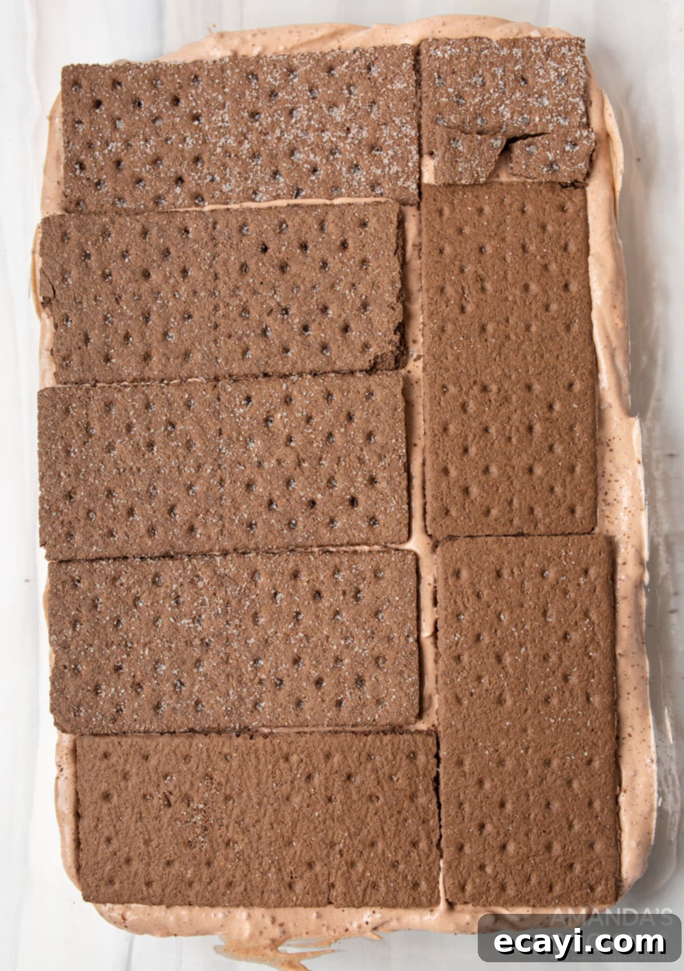 Chilled Chocolate Dream 8 graham crackers on top of chocolate pudding mix in baking dish