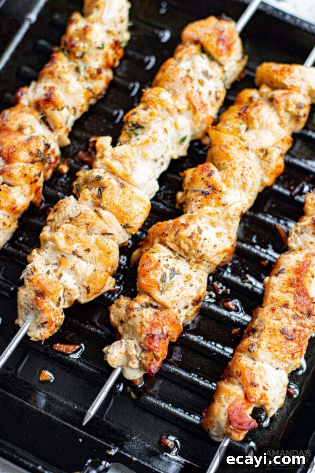 Lemon-Herb Mediterranean Chicken Skewers 2 Close-up of Greek Chicken Kabobs sizzling on the grill