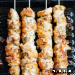 Lemon-Herb Mediterranean Chicken Skewers 10 Grilled Greek Chicken Kabobs with a vibrant salad