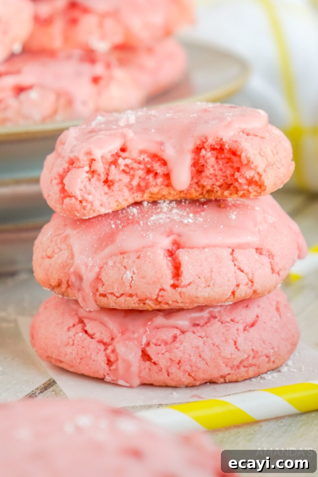 Easy Strawberry Cake Mix Cookies 2 stack of Strawberry Cake Mix Cookies, soft and chewy with pink glaze