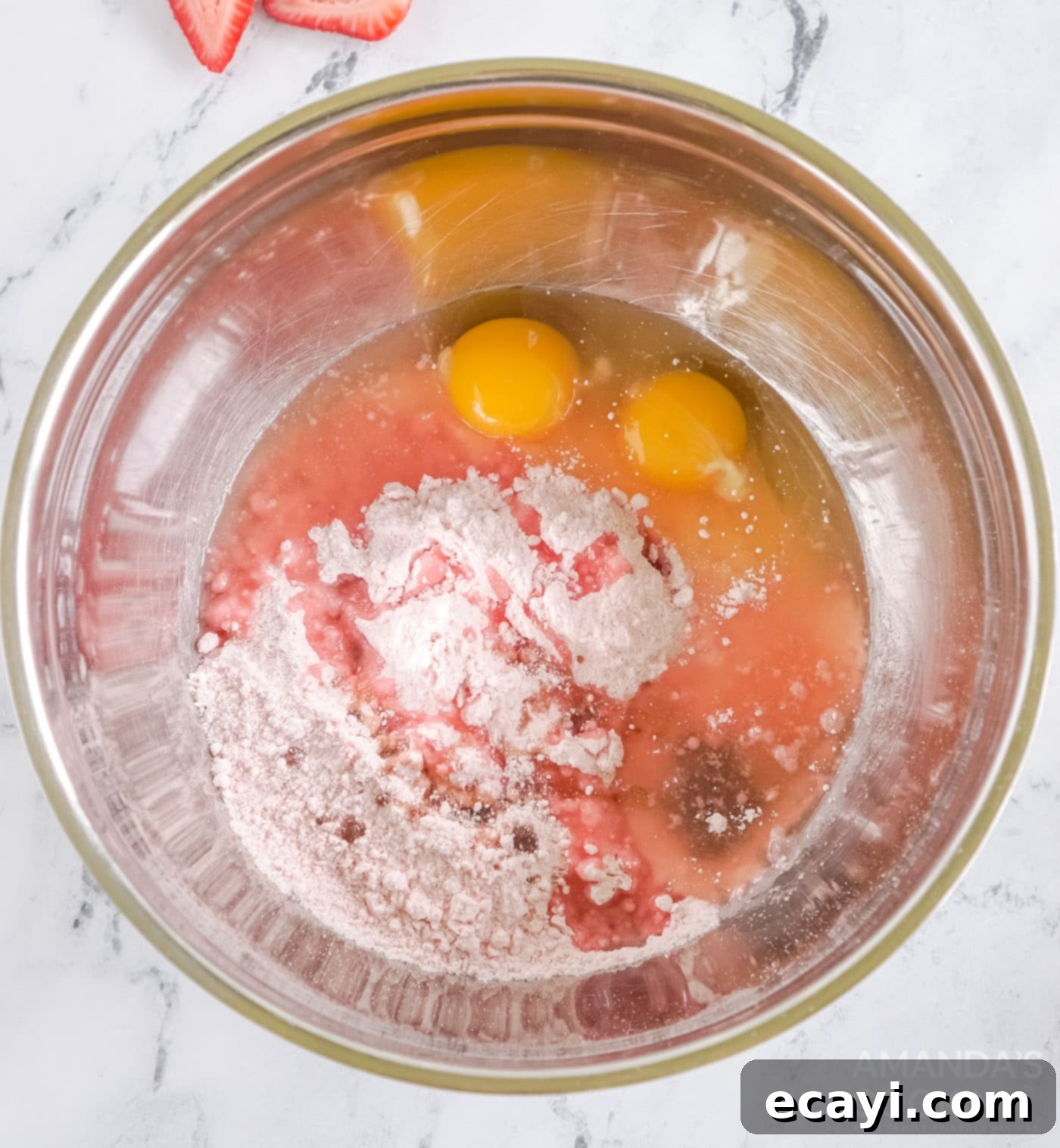 Easy Strawberry Cake Mix Cookies 5 eggs, oil, and strawberry cake mix in a bowl