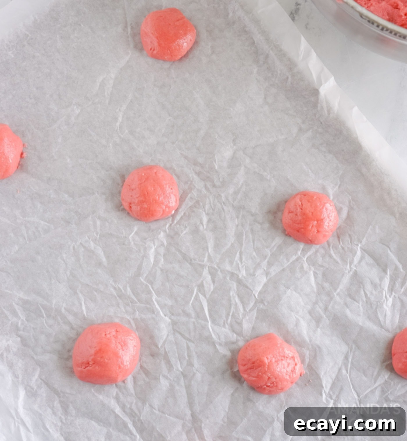 Easy Strawberry Cake Mix Cookies 7 cake mix cookies on parchment paper