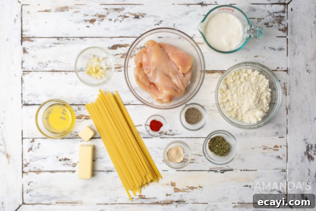 Creamy Chicken Alfredo 4 A selection of fresh ingredients laid out for making Chicken Alfredo