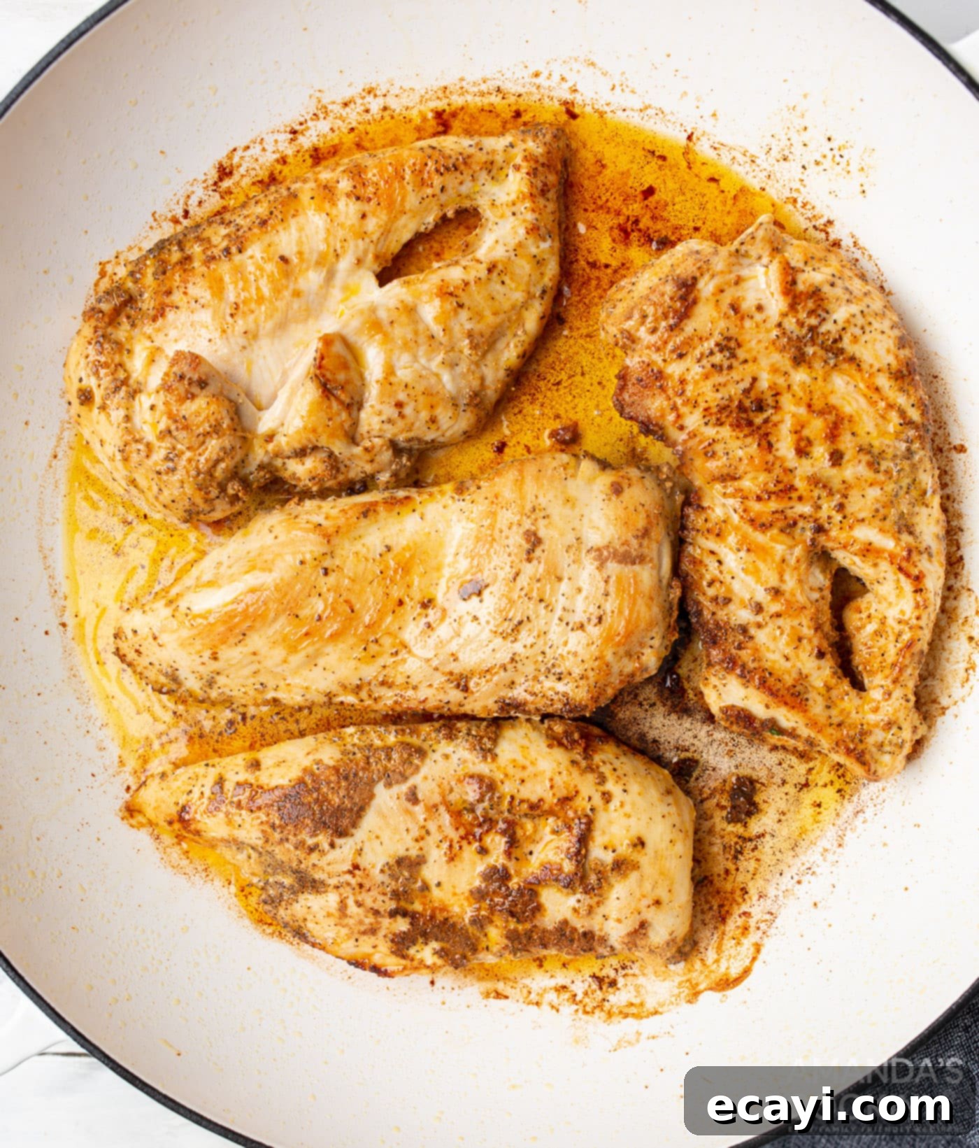 Creamy Chicken Alfredo 5 Seasoned chicken breasts in a bowl, ready for cooking