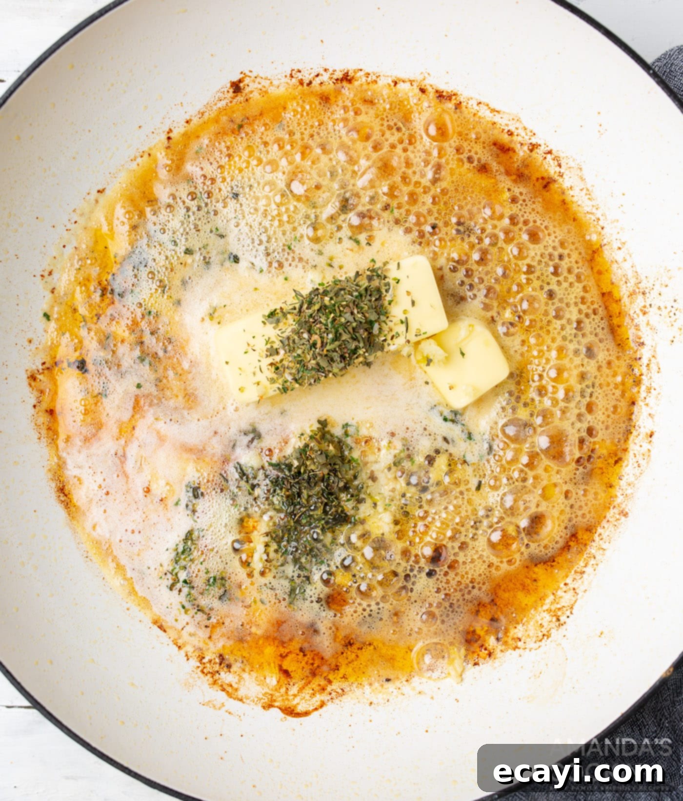Creamy Chicken Alfredo 6 Butter and seasoning melting in a skillet for the alfredo sauce base