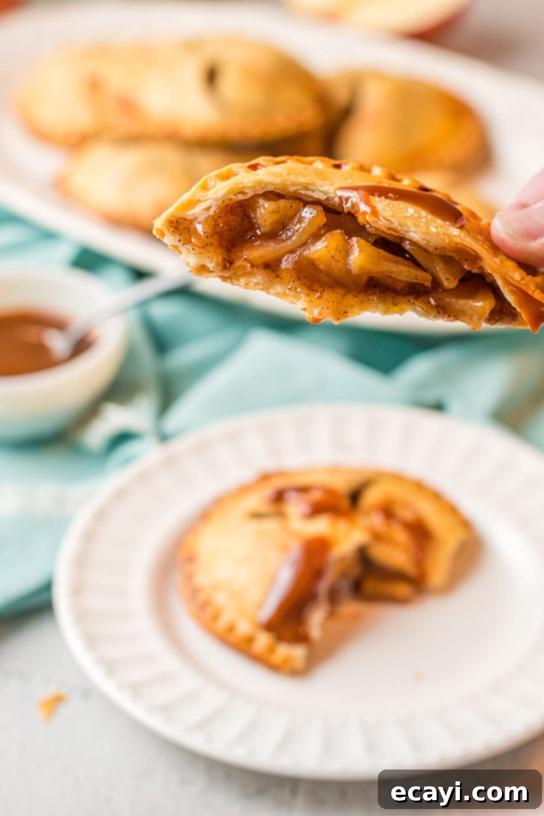 Golden Apple Pockets 3 Apple Hand Pie cut in half, revealing the spiced apple filling