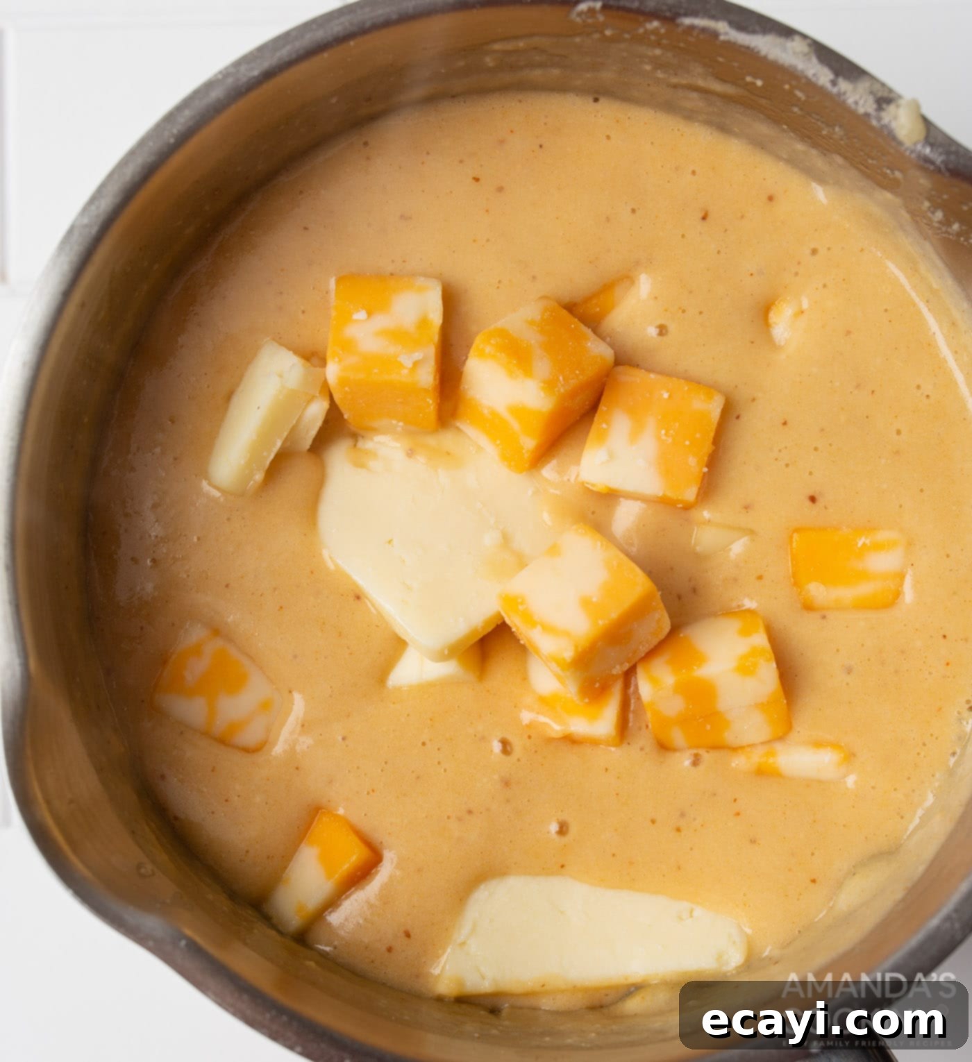 Hoppy Cheese Indulgence 8 cubed cheese in butter and beer roux
