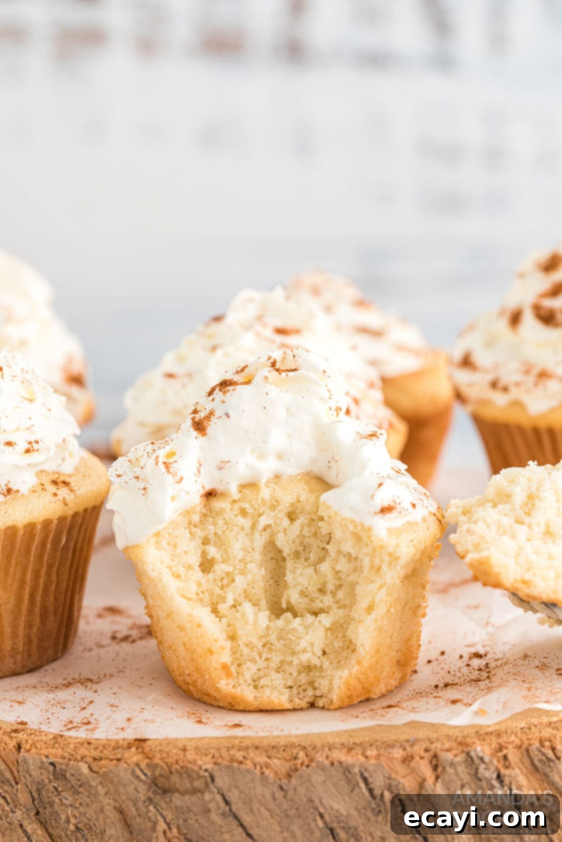 Genius 3-Ingredient Apple Pie Cupcakes 2 apple pie cupcake with bite out of it