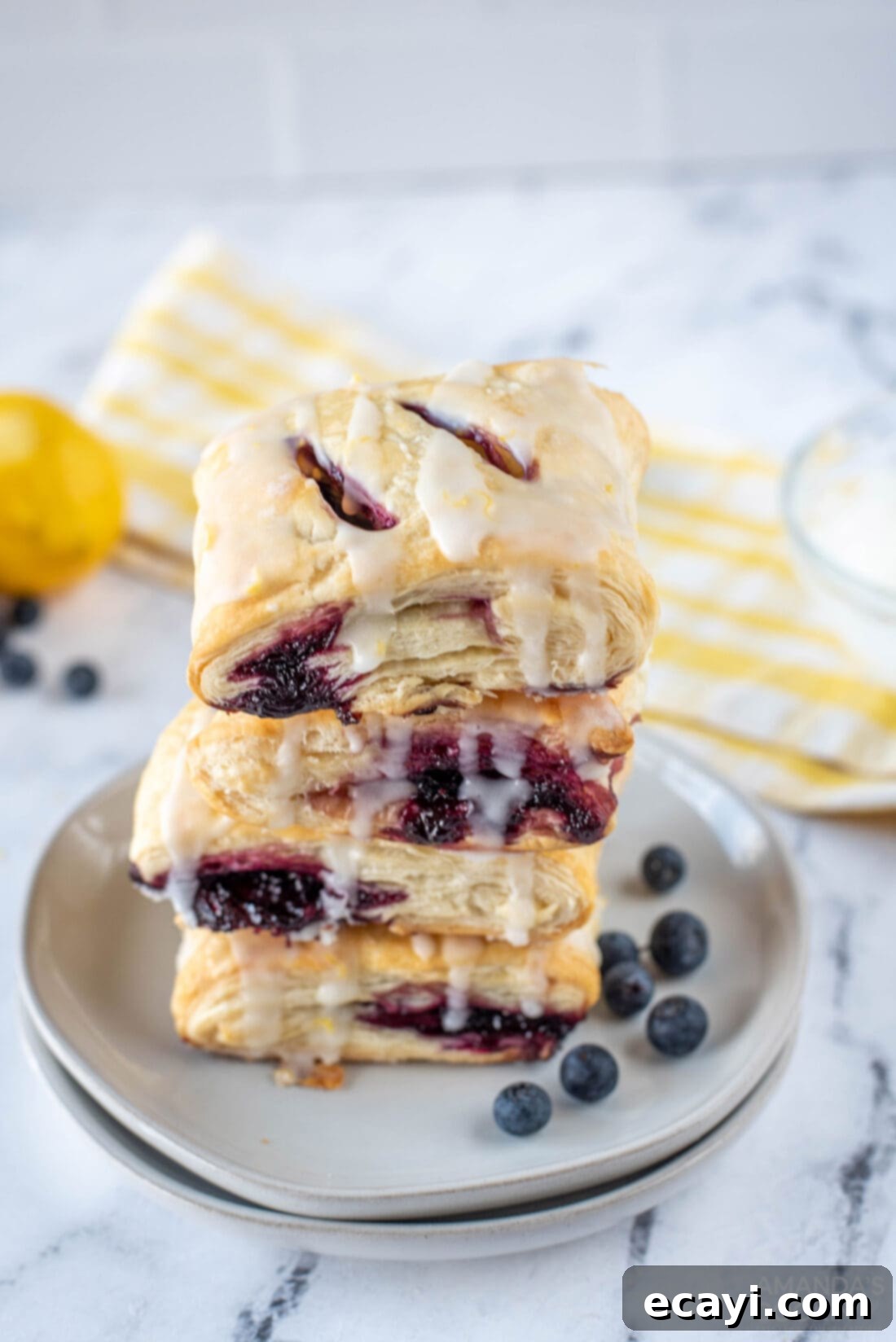Sunshine Berry Pastry Pockets 2 stacked Lemon Blueberry Croissant Hand Pies
