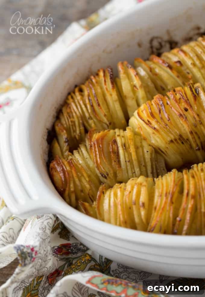 Golden Crispy Roast Potatoes 2 Delicious and tender Crispy Roast Potatoes served in a casserole dish