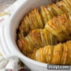 Golden Crispy Roast Potatoes 7 casserole dish of sliced potatoes