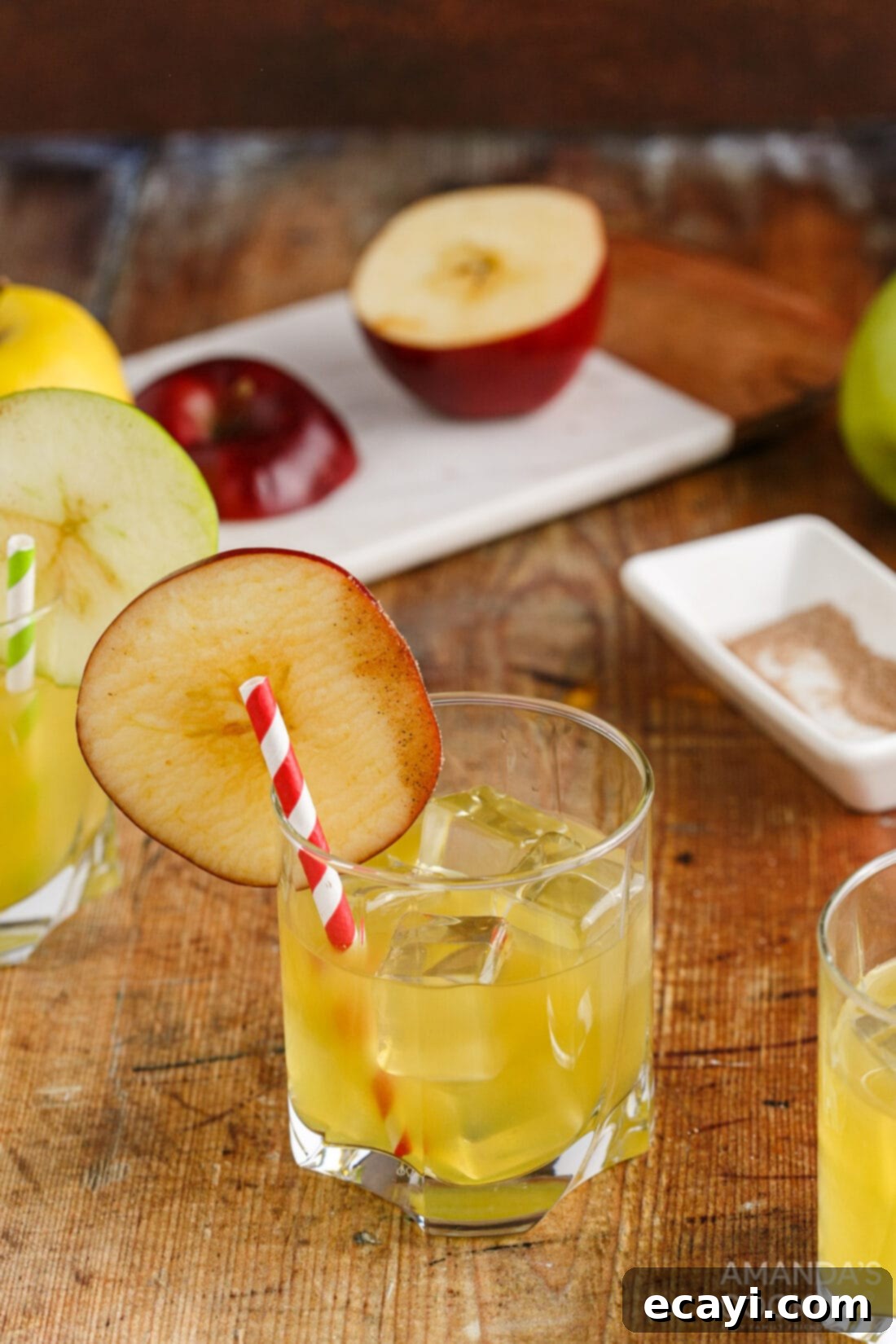 Harvest Spice Apple Elixir 3 Cinnamon Applesauce Cocktail with a cutting board and ingredients in the background