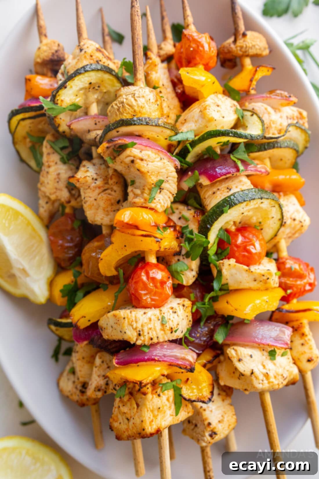 Effortless Air Fryer Chicken Kabobs 2 Platter of perfectly grilled Air Fryer Chicken Kabobs with colorful vegetables