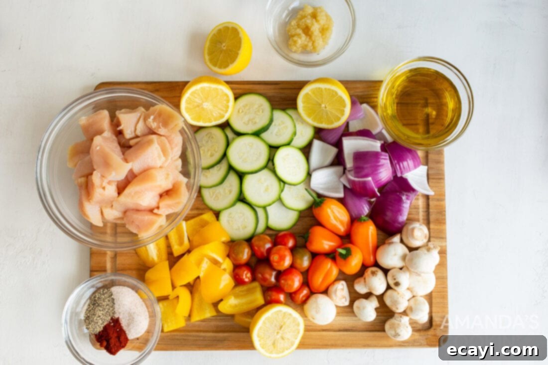 Effortless Air Fryer Chicken Kabobs 4 All ingredients for Air Fryer Chicken Kabobs laid out on a counter