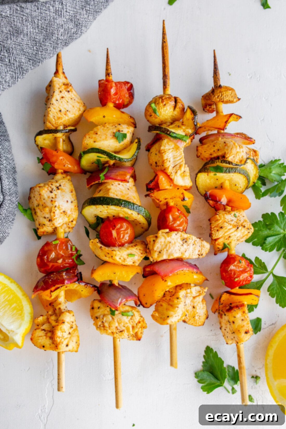 Effortless Air Fryer Chicken Kabobs 9 Beautifully plated Air Fryer Chicken Kabobs garnished with fresh parsley
