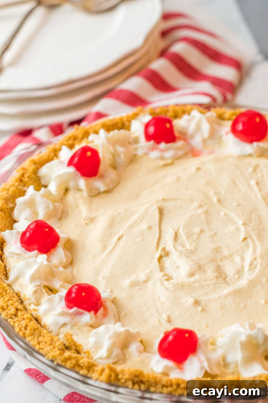 Frothy Root Beer Dream Pie 2 Root Beer Float Pie with cherry garnish, showing its creamy texture