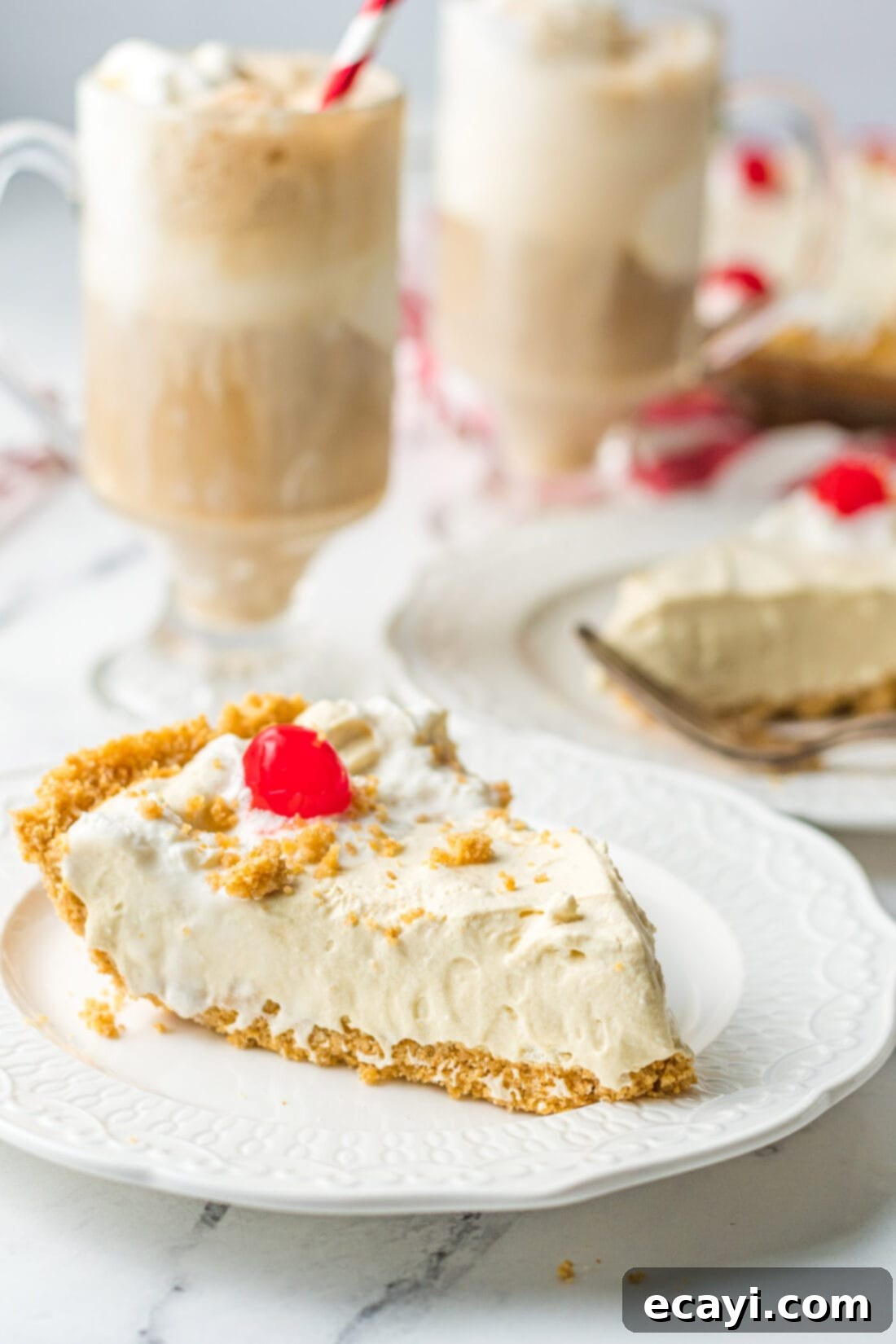 Frothy Root Beer Dream Pie 11 A perfectly sliced piece of Root Beer Float Pie on a white plate