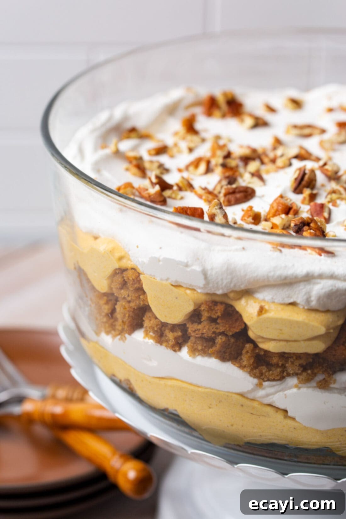 Autumn Pumpkin Delight 2 Pumpkin Trifle - Soft delicate layers of gingerbread cake, velvety rich pumpkin cheesecake, and a topping of whipped cream and pecans.