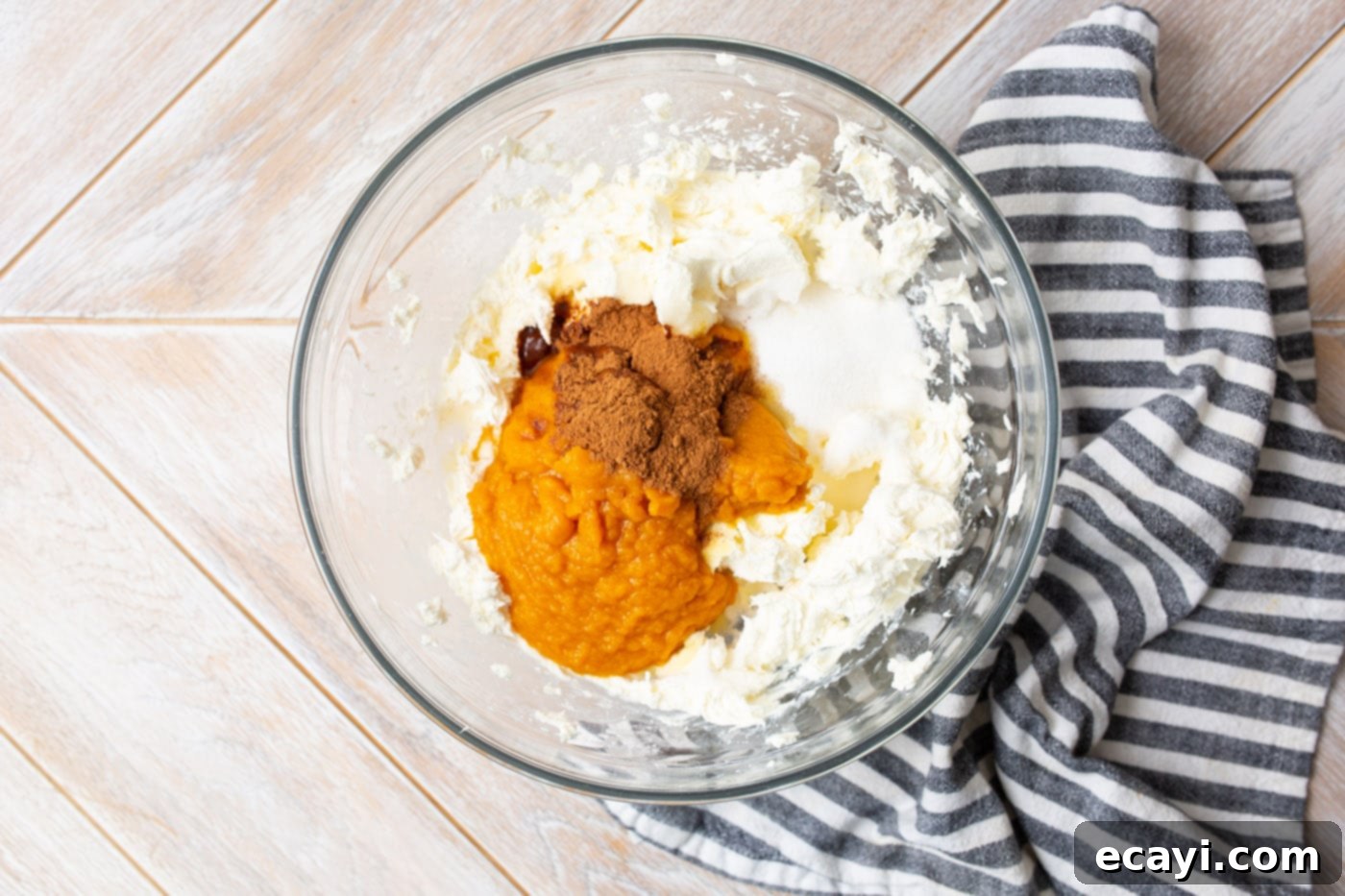 Autumn Pumpkin Delight 5 cream cheese, pumpkin puree, pie spice and vanilla in a mixing bowl